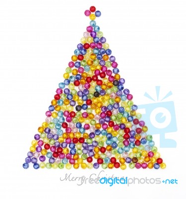Christmas Tree Decorate By Colorful Beads On White Background Stock Photo