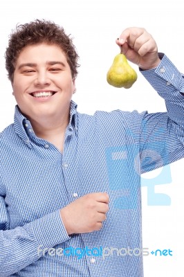Chubby Man Holding Pear Stock Photo