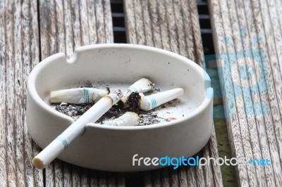 Cigarette And Ashtray Stock Photo