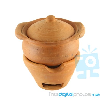 Clay Closed Pot And Stove Pottery On White Background Stock Photo
