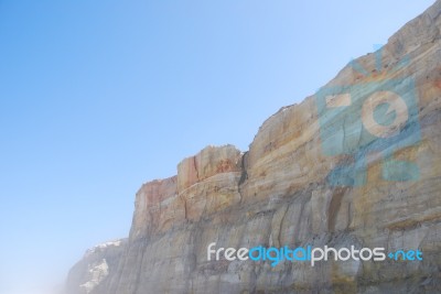 Cliff At Praia Del Rey Stock Photo