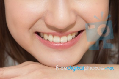 Close-up Asian Woman Smiling With White Teeth Stock Photo