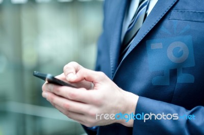 Close Up Of A Man Using Mobile Phone Stock Photo