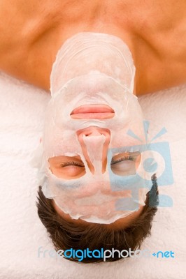 Close-up Of A Young Man With Face Mask Stock Photo