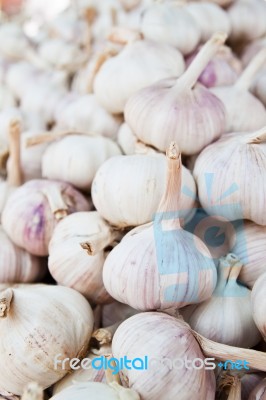 Close Up Of Garlic background Stock Photo