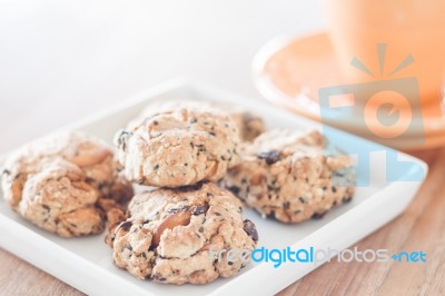 Closeup Healthy Cookies On White Plate With Coffee Cup Stock Photo