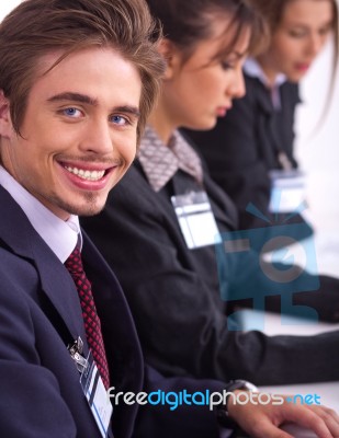 Closeup Of Attractive Business Men With Colleague Stock Photo