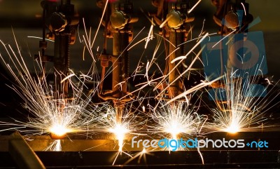 Cnc Lpg Cutting Steel Plate With Sparks Close Up Stock Photo