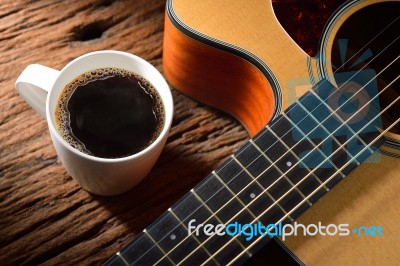 Coffee And Guitar Stock Photo