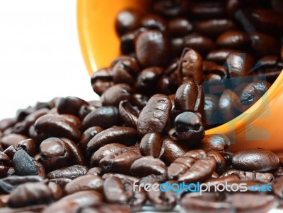 Coffee Beans In Mug Stock Photo