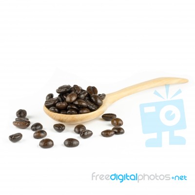 Coffee Beans In Olive Wood Spoon Stock Photo