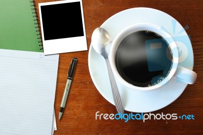 Coffee Cup And Paper Stock Photo