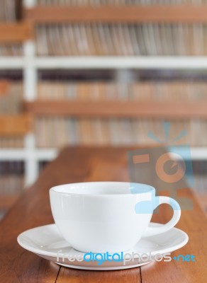 Coffee Cup On Wooden Table Stock Photo