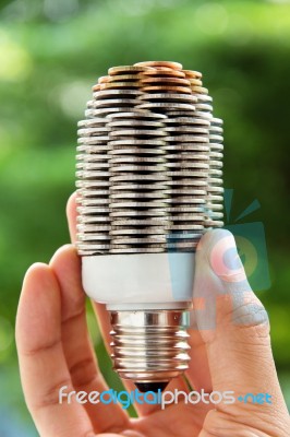 Coin Light Bulb Concept Stock Photo