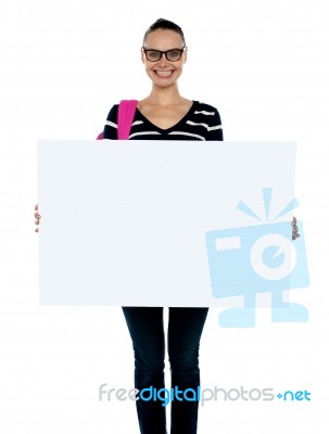 College Student Holding White Board Stock Photo