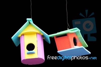 Colorful Bird House Isolated On Black Background Stock Photo