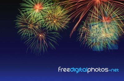 Colorful Fireworks Celebration And The Twilight Sky Background Stock Photo