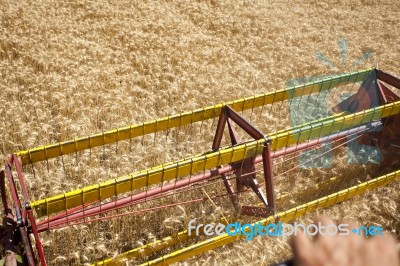 Combine Harvester In Field Stock Photo