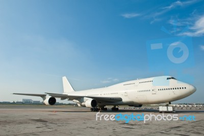 Commercial Airplane Parking Stock Photo