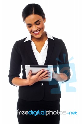 Company Manager Browsing On Tablet Pc Stock Photo