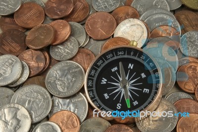 Compass On Coins Stock Photo