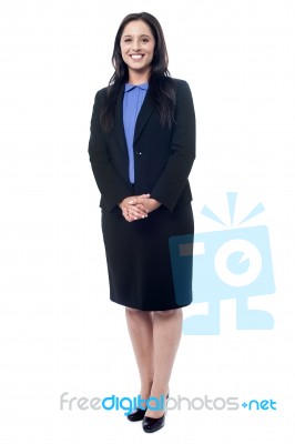 Confident Businesswoman Standing Stock Photo