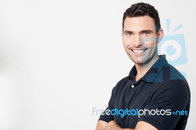 Confident Young Man Posing Over White Stock Photo