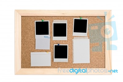 Corkboard With Empty Frame And Notes Stock Photo
