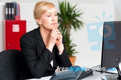 Corporate Lady Looking Into Computer Screen Stock Photo
