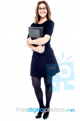 Corporate Woman With Folder Stock Photo