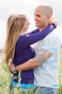 Couple Embracing Outdoors Stock Photo