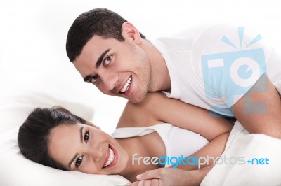 Couple Having Fun In Bed Stock Photo