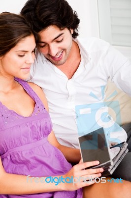 Couple Looking At Cds Stock Photo
