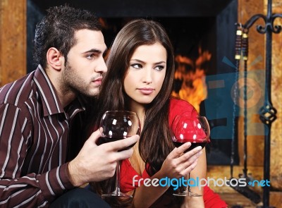 Couple Near Fireplace Stock Photo