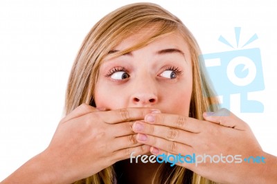 Covering Her Mouth With Both Hands Stock Photo