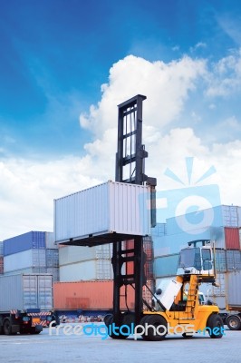Crane Lifting Up Container Stock Photo