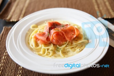 Cream Sauce Spaghetti With Smoked Salmon Stock Photo