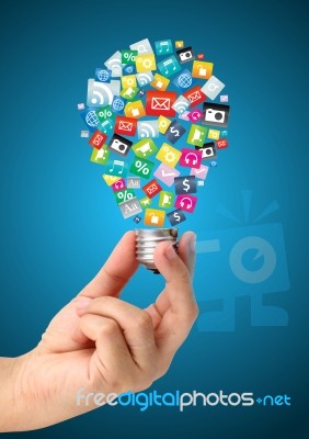 Creative Light Bulb Idea In Hand With App Cloud Stock Image