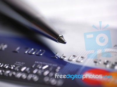 Credit Card And Ballpoint Pen Stock Photo