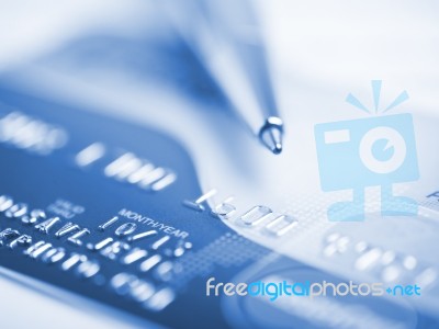 Credit Card And Ballpoint Pen Stock Photo
