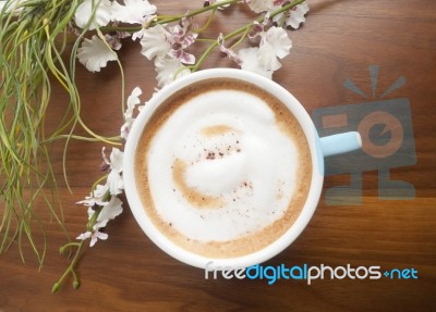 Cup Of Coffe With Flower Stock Photo