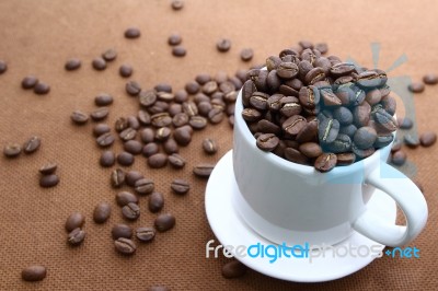 Cup Of Coffee Beans Stock Photo