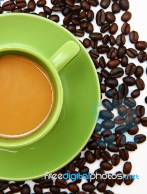Cup Of Coffee With Beans Stock Photo