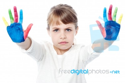 Cute Girl With Painted Hands Stock Photo