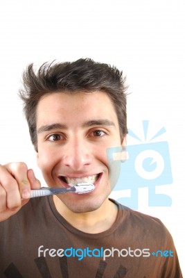 Cute Guy Washing His Teeth Stock Photo