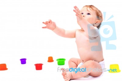 Cute Infant Boy With Toys Stock Photo