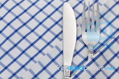 Cutlery On Napkin Stock Photo