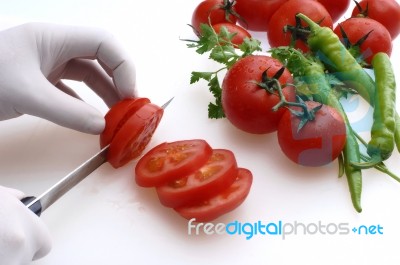 Cutting Tomatoes Stock Photo