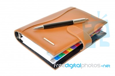 Daily Planner With Pen Stock Photo