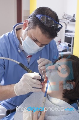 Dentist At Work Stock Photo